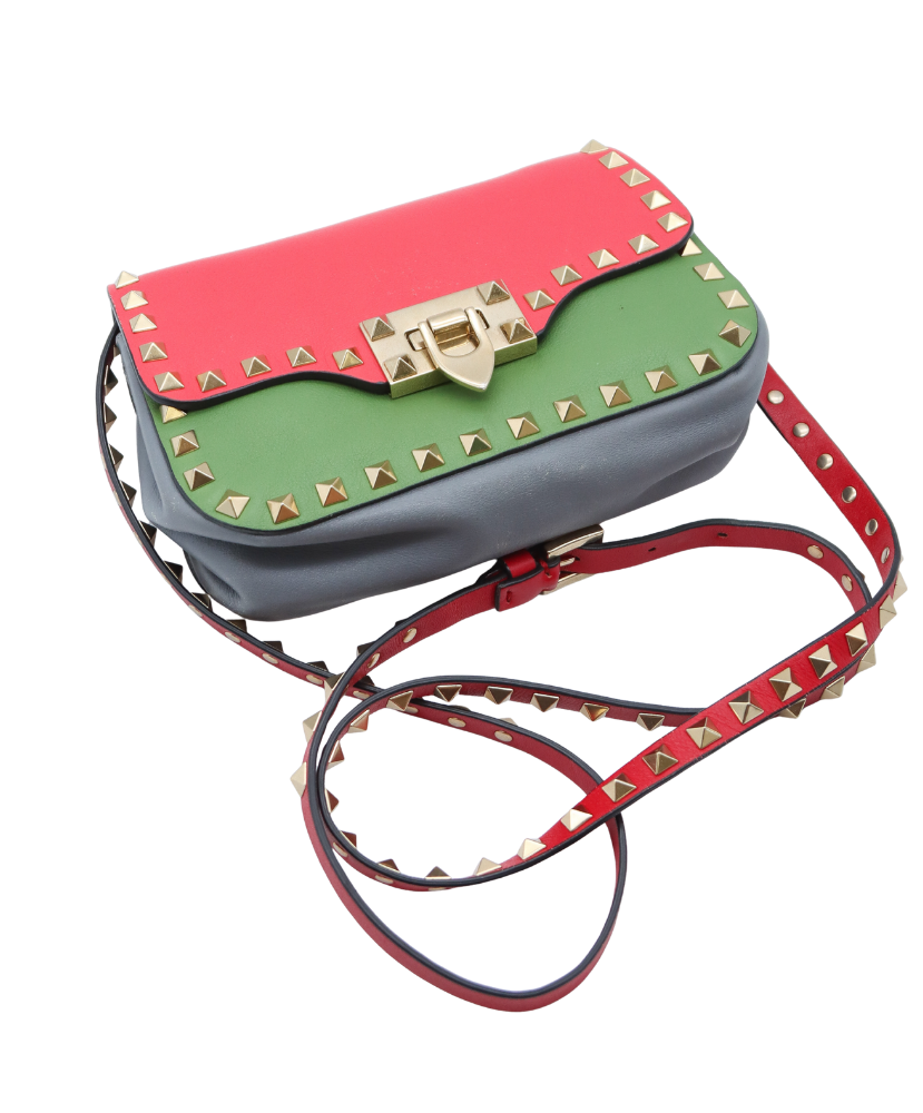 Multicolored Valentino handbag with studded details on a white background