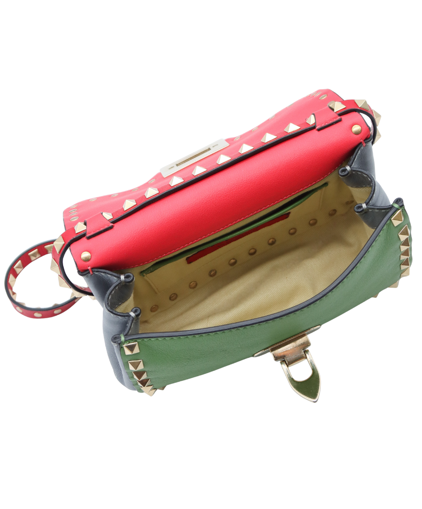 Multicolored Valentino handbag with studded details on a white background