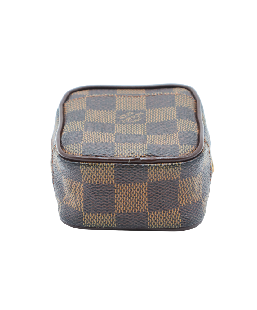 Louis Vuitton Designer handbag with checkered pattern and gold zipper on a white background