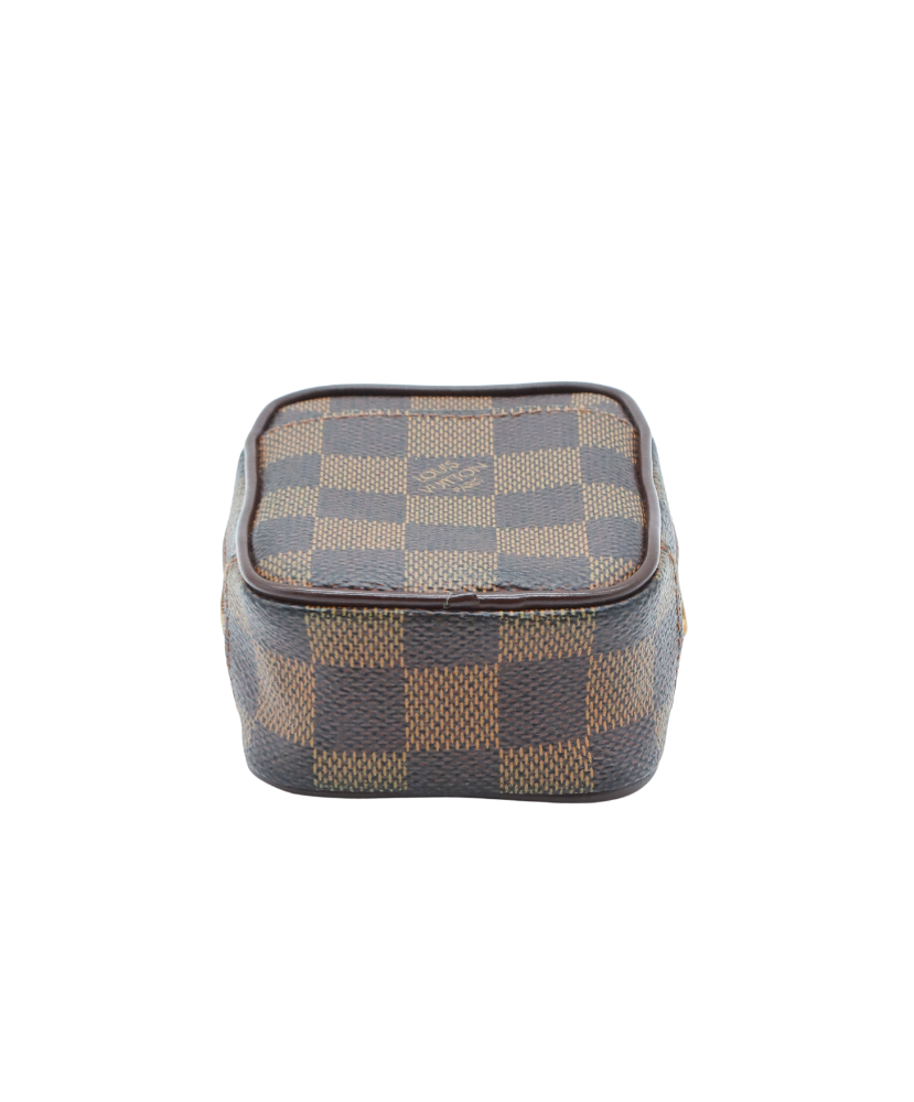 Louis Vuitton Designer handbag with checkered pattern and gold zipper on a white background