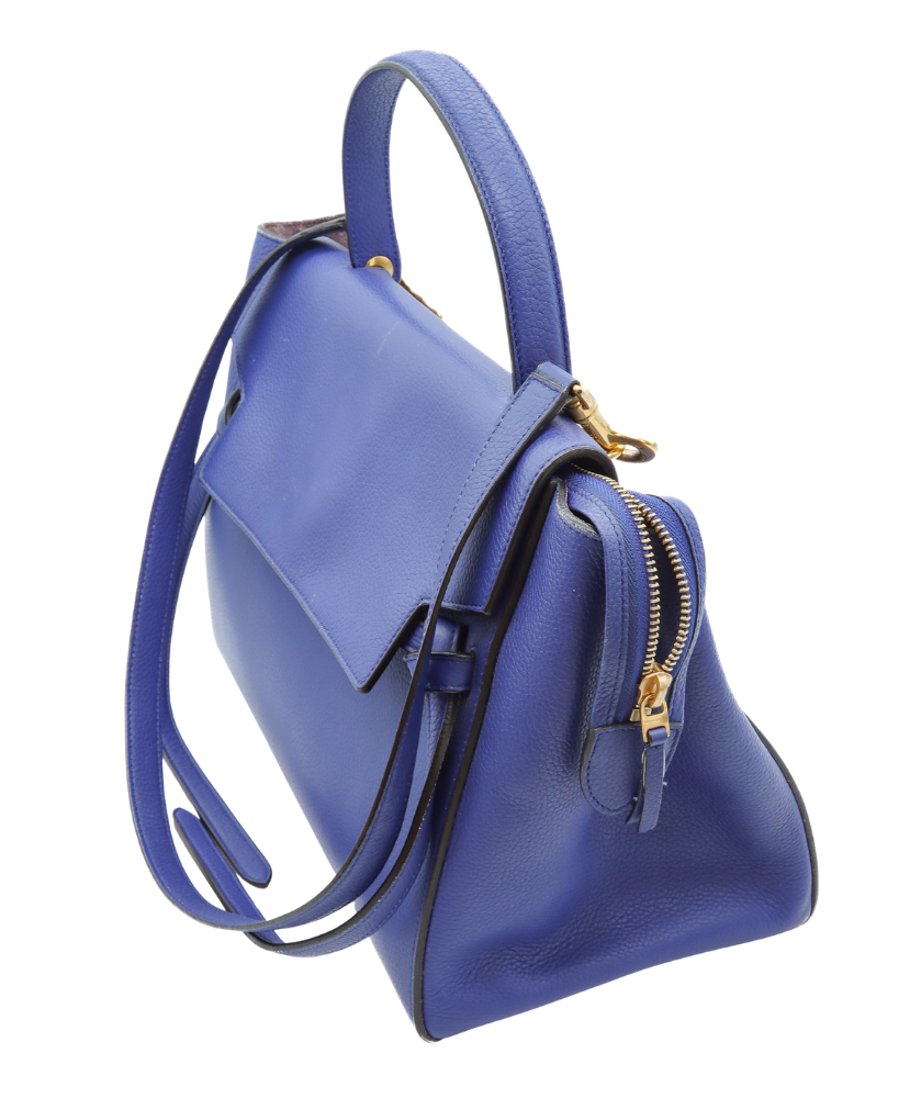Blue Celine leather handbag with gold zipper on a white background