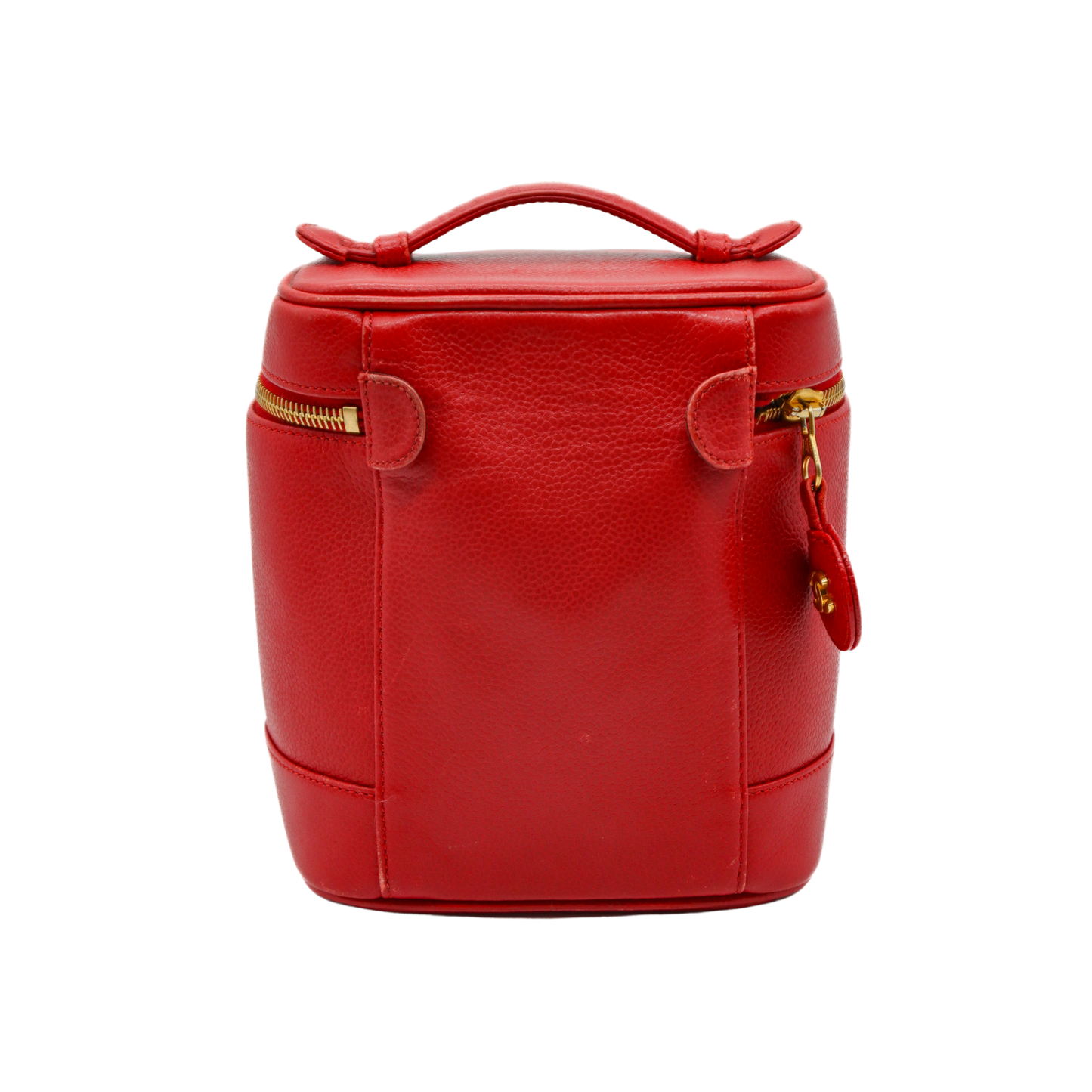 Red leather handbag with gold zipper on a white background