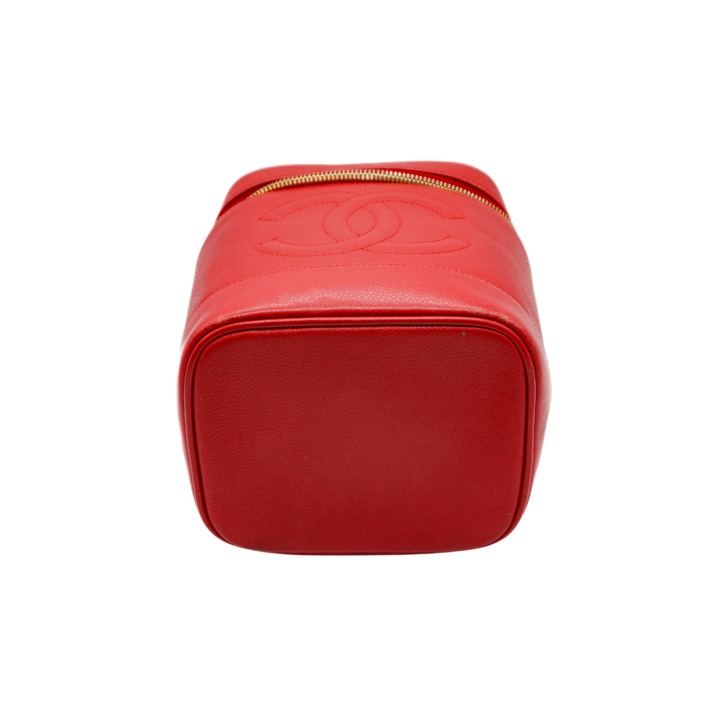 Red cosmetic bag with a gold zipper on a white background