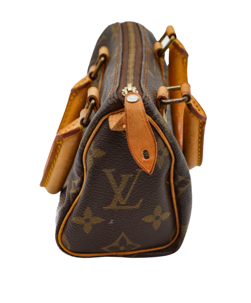 Louis Vuitton monogram handbag with brown handles on a white background