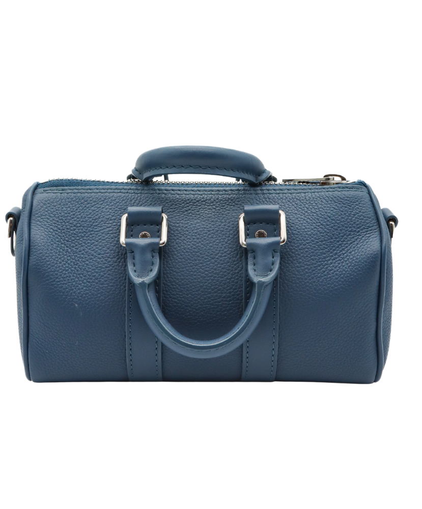 Blue Louis Vuitton luggage bag with silver buckles on a white background