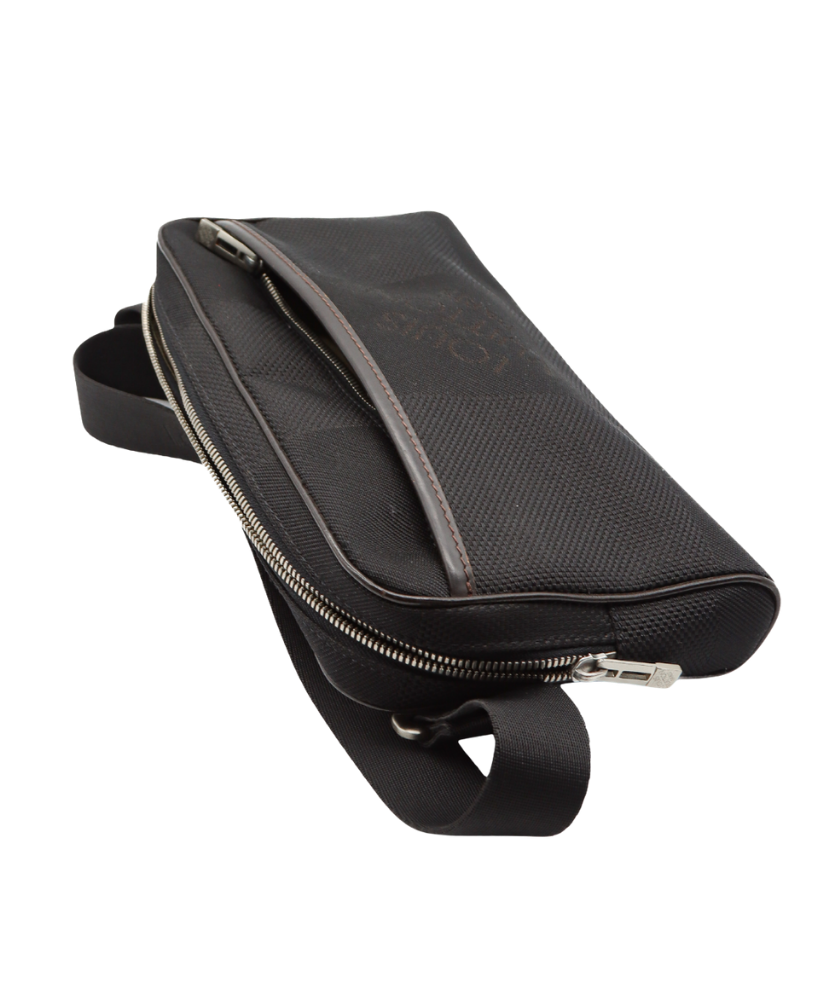 Black Louis Vuitton belt bag with 'Louis Vuitton' branding on a white background