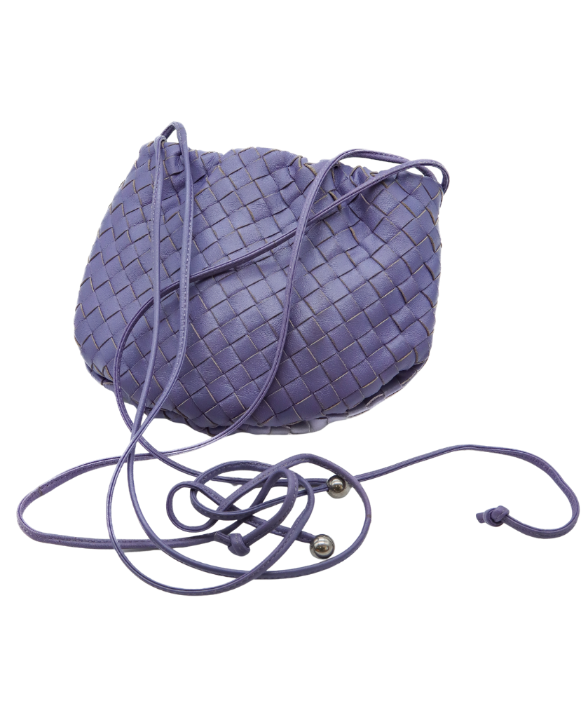 Purple woven Bottega handbag with drawstring on a white background