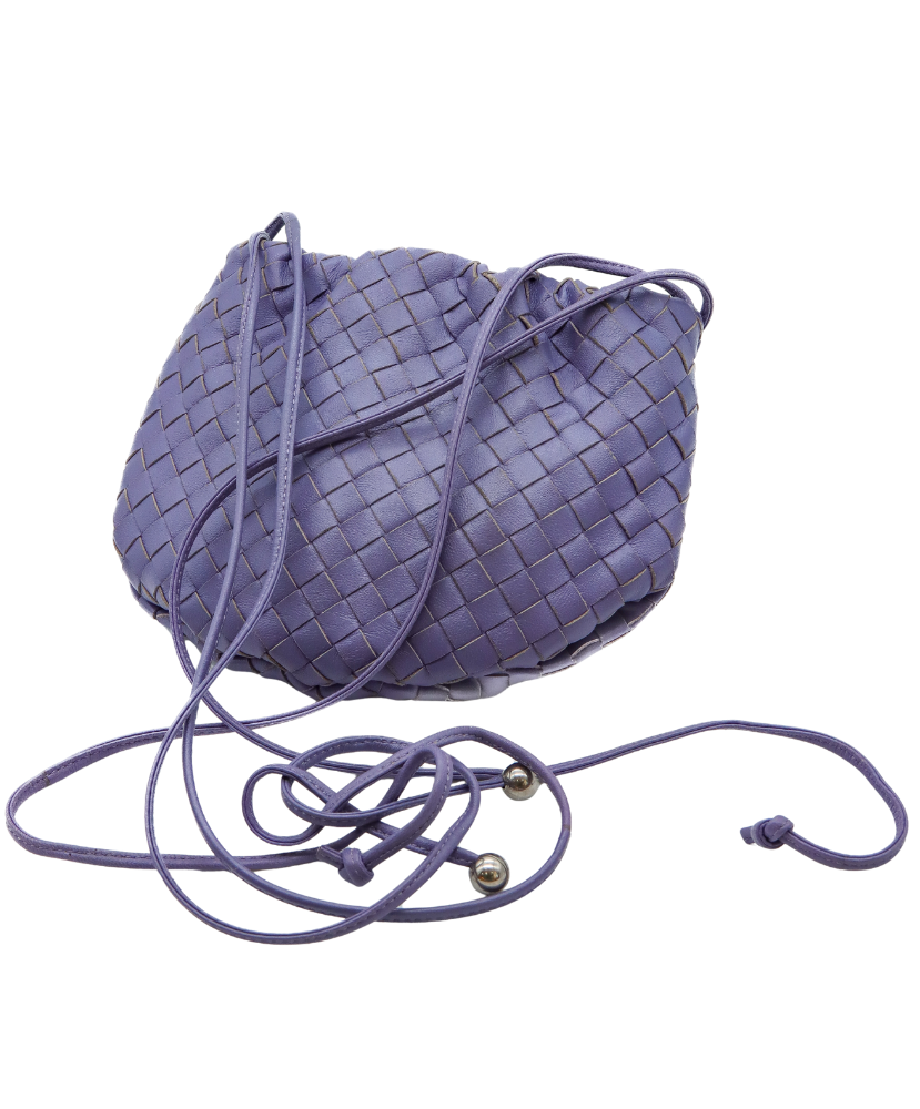 Purple woven Bottega handbag with drawstring on a white background