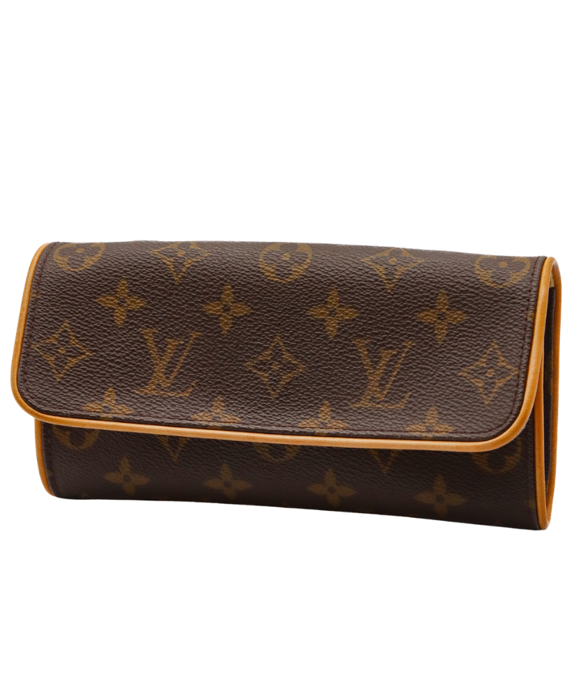 Brown leather Louis Vuitton crossbody with brand logo on a white background