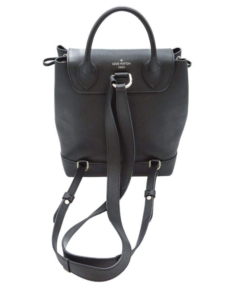 Black Louis Vuitton leather backpack with a gold logo on a white background