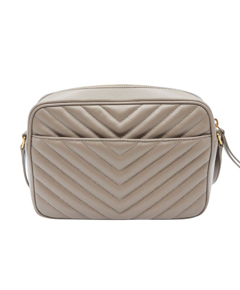 Beige Saint Laurent handbag with gold logo on a white background